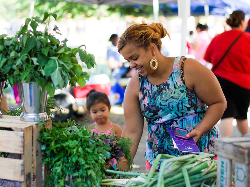 Photo of farmers market customers