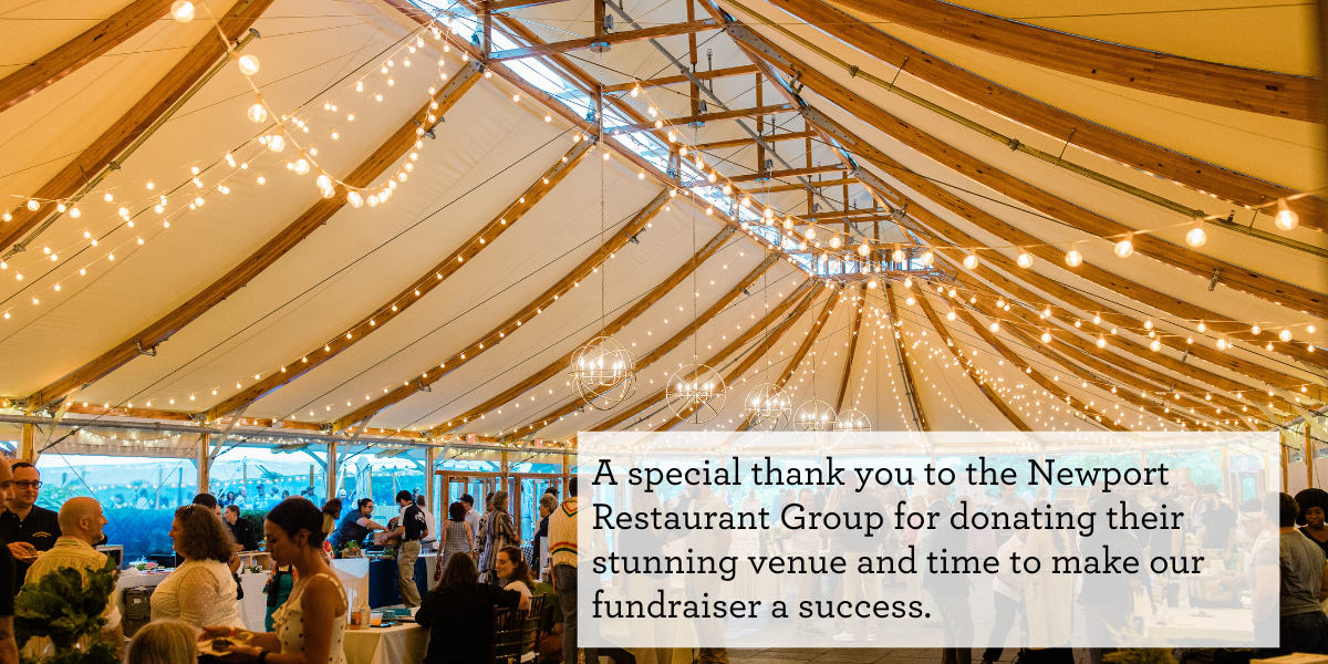 Interior Photo of Tent at Local Food Fest with a Thank you to Newport Restaurant Group